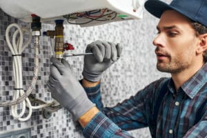 bogota plumber performing tankless water heater installation