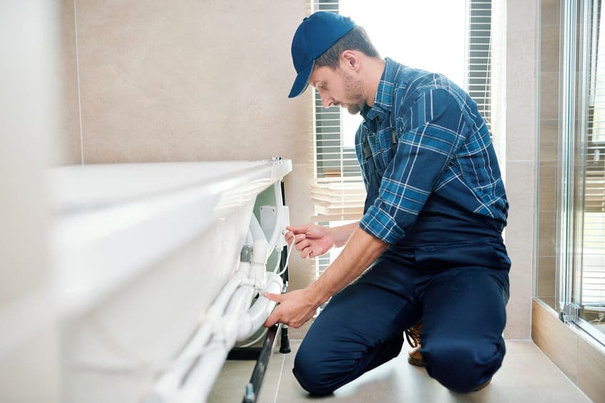 plumber performing drain and sewer line replacement in teaneck